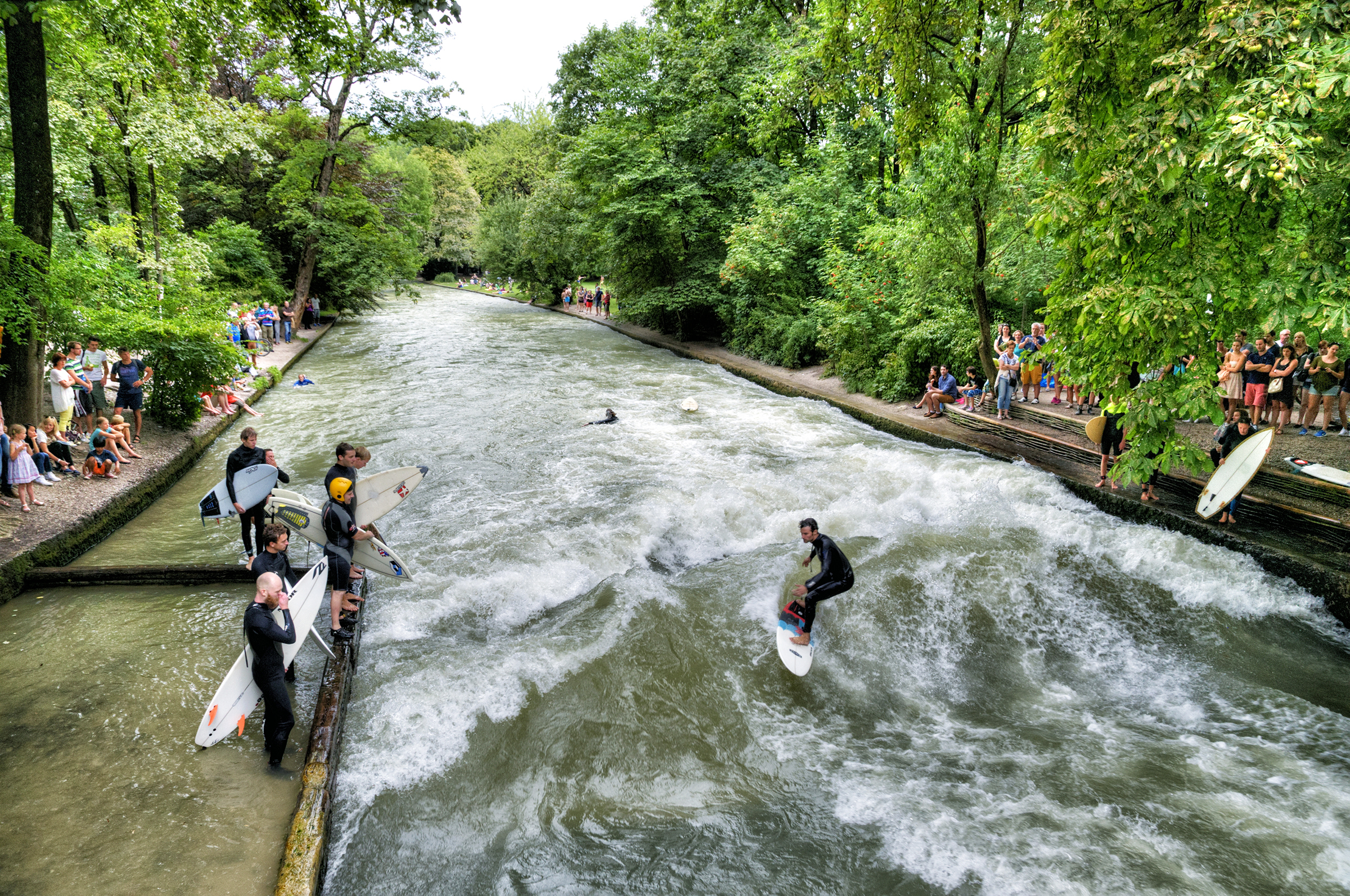 Surfing the Eisbach Munich Germany