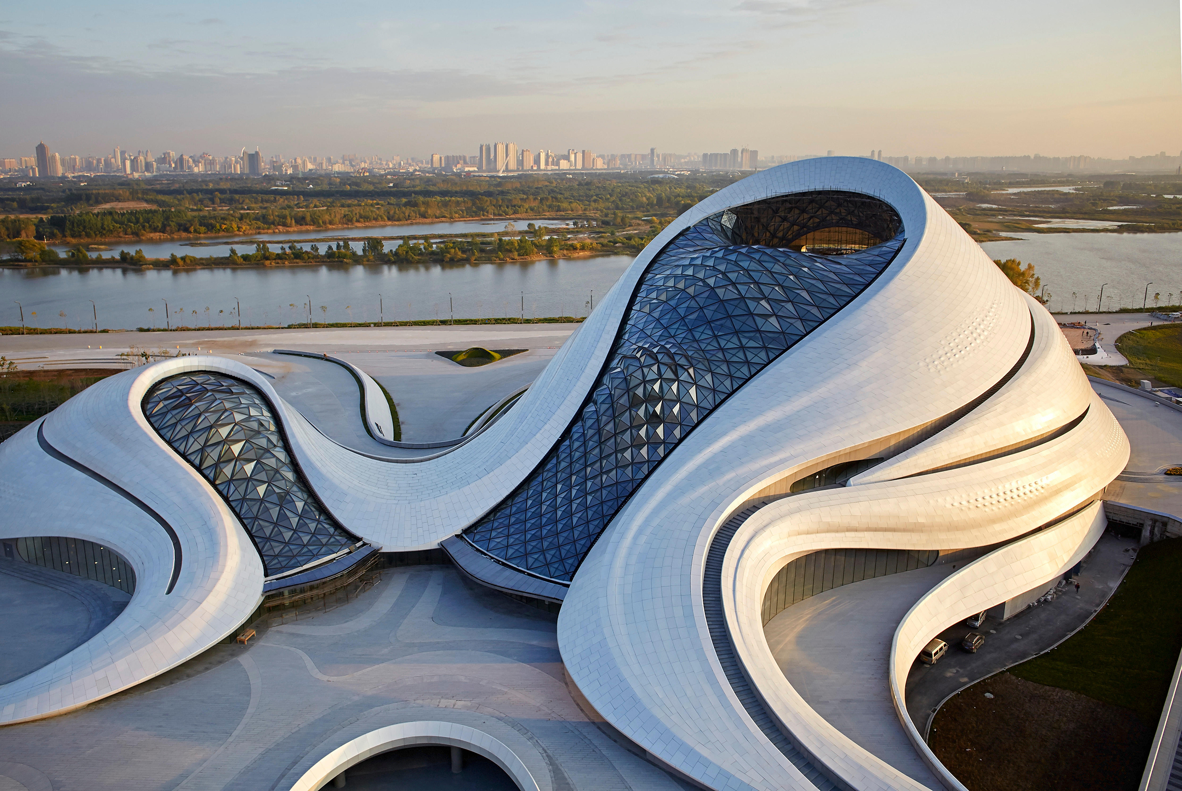 Aerial view of opera house embedded in Harbins wetland landscape Harbin Opera House Harbin China Architect MAD Architects