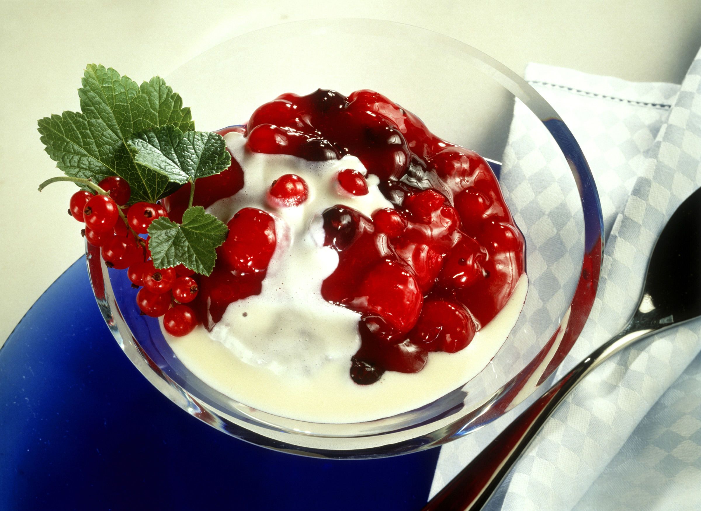 Fruit Compote with White Chocolate Sauce in a Bowl
