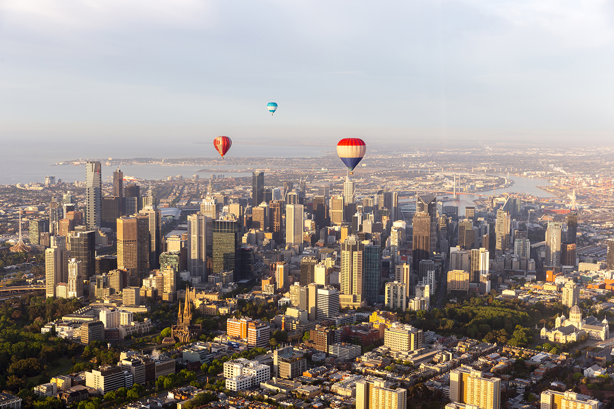 Hot air balloons flying directly past Melbourne Australia